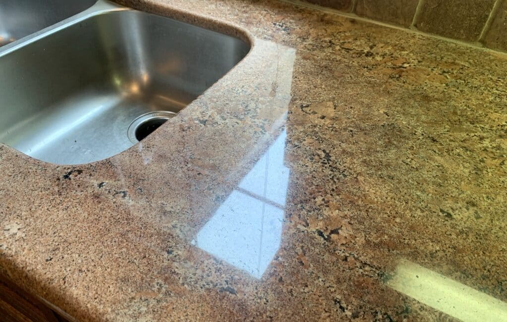 granite hard water build up removed